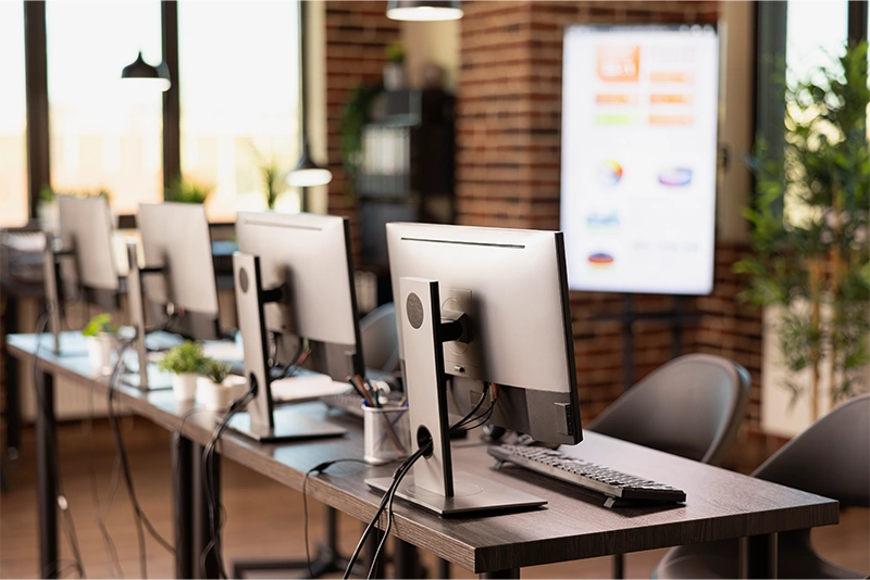 Modern office workstations representing Optimal Group’s managed IT services environment